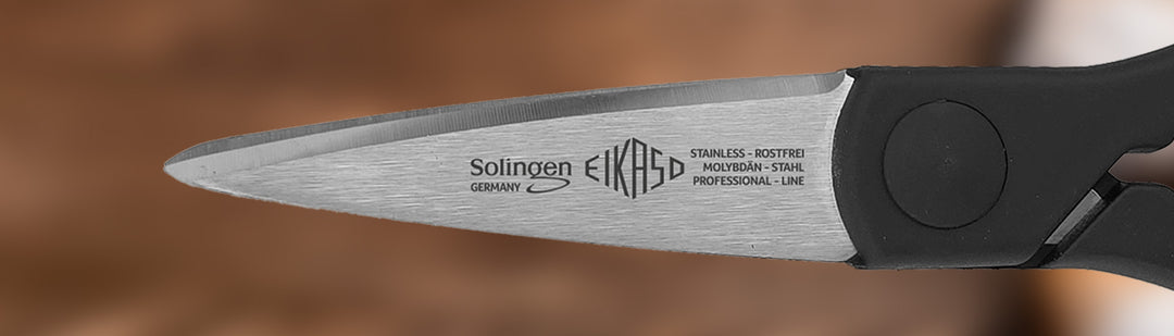 All-purpose scissors with black handle